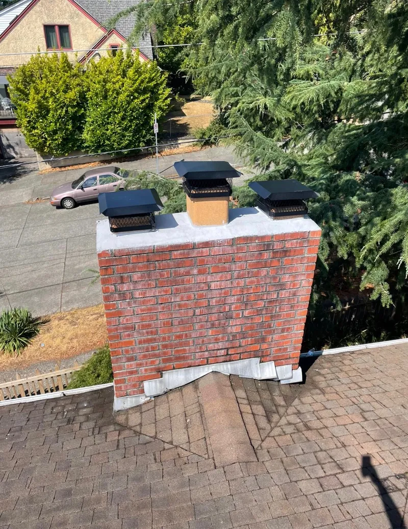 Clean restored multi-cap chimney on an Eastside home